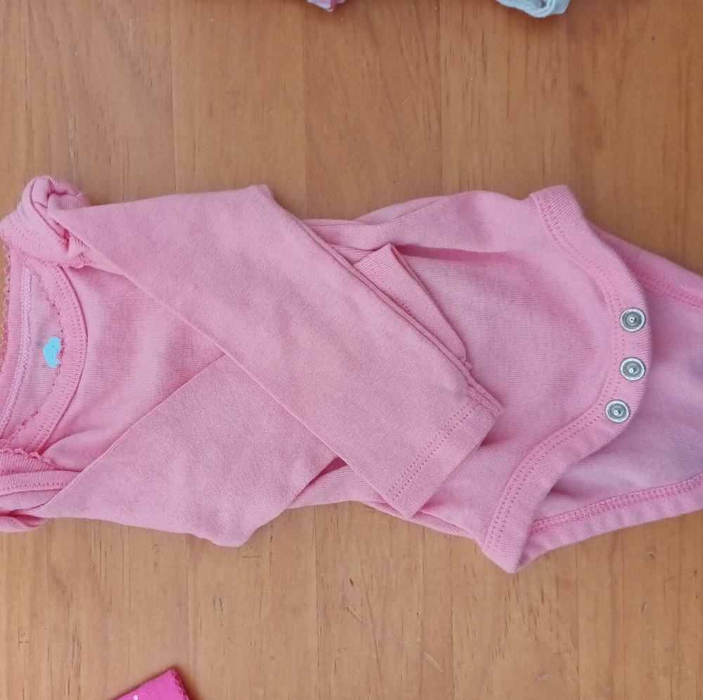 Plain pink newborn body suit
